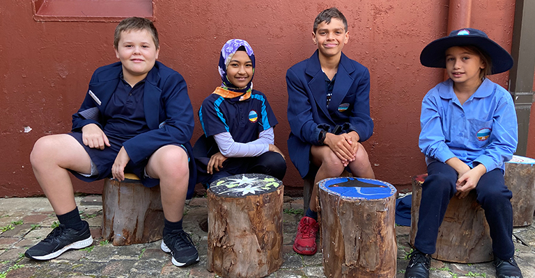 La Perouse Public School students who helped paint the moveable log seats