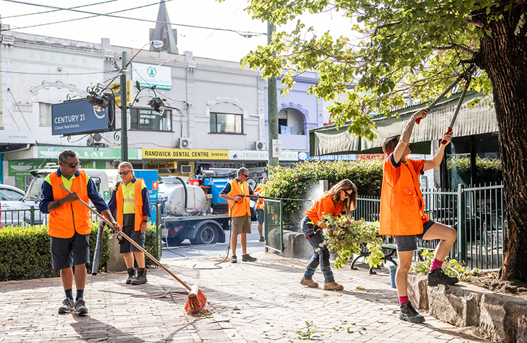 A group of Council workers cleaning the streets of Randwick.