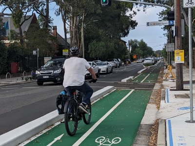 Cyclist riding on the Kingsford to Centennial Park cycleway.