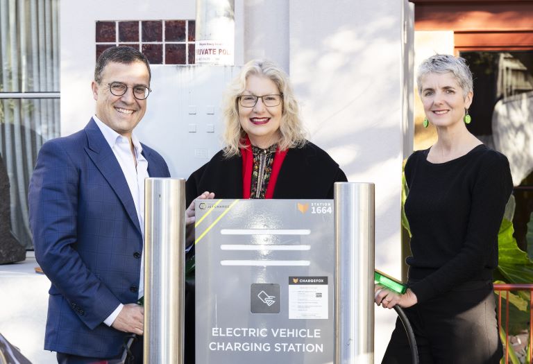 The Mayors of Randwick, Woollahra and Waverley pose at an Electrical Vehicle charging station