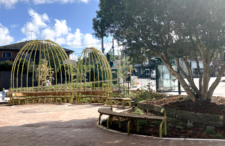 Image of part the new seating and sculptural shade structures at a new pocket park in Randwick